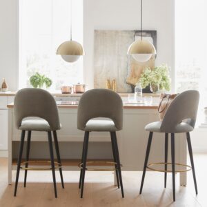 Bar chair with grey cushion, black metal finish and gold footrest ring