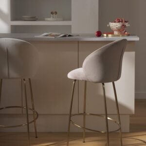 Bar chair with light pink cushion and gold metal finish